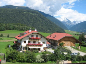 Гостиница Ferienwohnungen Färberhof Urlaub auf dem Bauernhof, Оланг